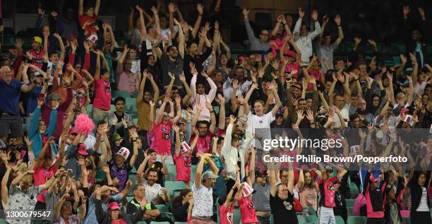 The crowd stand up during a Mexican wave during the Big Bash League Final match between the Sydney Sixers and the Perth Scorchers at the Sydney...