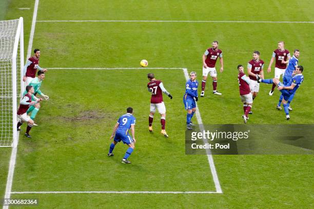 Lewis Dunk of Brighton and Hove Albion scores his team's first goal during the Premier League match between Burnley and Brighton & Hove Albion at...