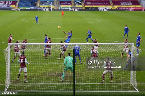 Lewis Dunk of Brighton & Hove Albion scores their team's first goal during the Premier League match between Burnley and Brighton & Hove Albion at...