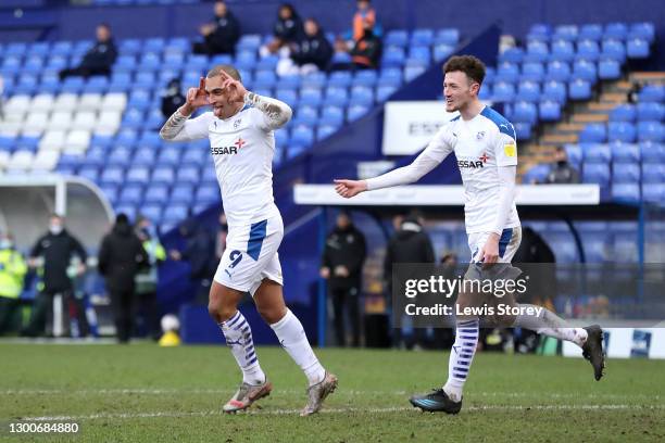 James Vaughan of Tranmere Rovers celebrates with Paul Lewis after scoring his team's third goal during the Sky Bet League Two match between Tranmere...