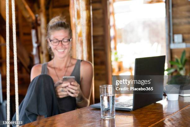 young woman in alternative home office setup - makeshift shelter stock pictures, royalty-free photos & images