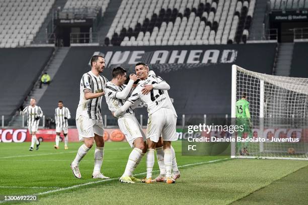 Cristiano Ronaldo of Juventus celebrates after scoring his team's first goal with team mates Federico Chiesa, Alvaro Morata and Leonardo Bonucci...