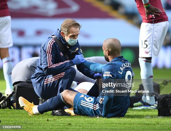 Jordan Reece Arsenal physio Jordan Reece treats Alex Lacazette during the Premier ...