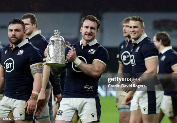 Scotland Captain Stuart Hogg of Scotland poses with the Calcutta Cup following their side's victory in the Guinness Six Nations match between England...