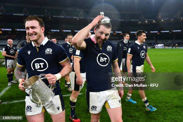 Scotland Captain Stuart Hogg and Finn Russell of Scotland pose with the Calcutta Cup following their side's victory in the Guinness Six Nations match...