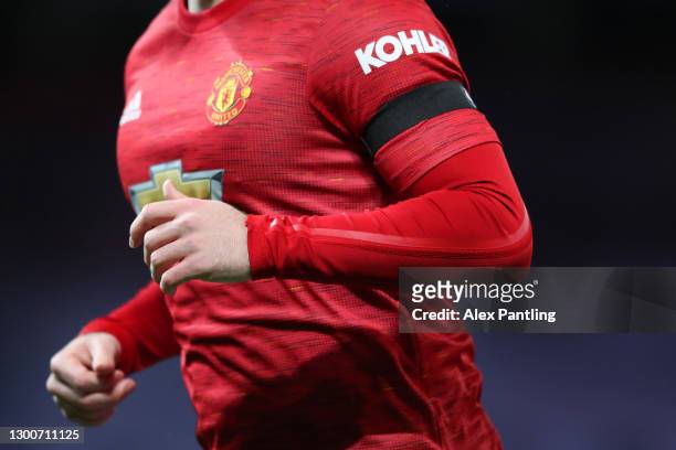 Detailed view of a black armband worn by Luke Shaw of Manchester United to mark the 63rd anniversary of the Munich air disaster during the Premier...