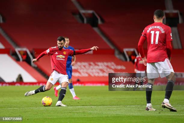 Bruno Fernandes of Manchester United scores their team's second goal during the Premier League match between Manchester United and Everton at Old...