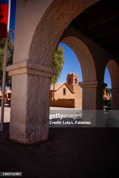 church of san pedro de atacama seen through archs, chile - calama stockfoto's en -beelden