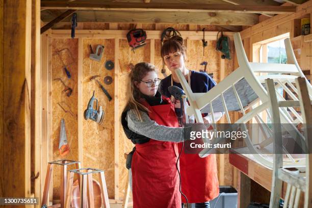 upcycling mother and daughter - social issues stock pictures, royalty-free photos & images