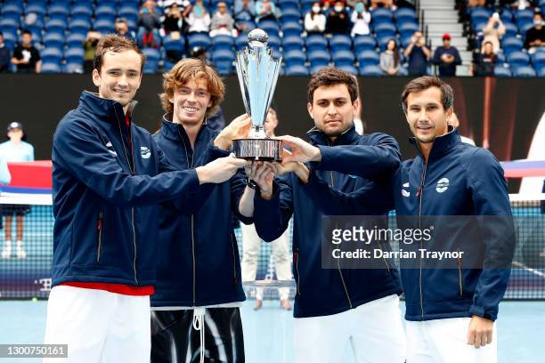 Team Russia pose with the ATP Cup Trophy after defeating Italy in the Final during day six of the 2021 ATP Cup at Rod Laver Arena on February 07,...