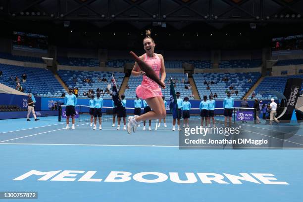 Elise Mertens of Belgium poses with the Gippsland Trophy after winning her Women's Singles Final match against Kaia Kanepi of Estonia during day...