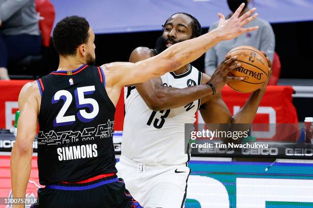 Ben Simmons of the Philadelphia 76ers guards James Harden of the Brooklyn Nets during the third quarter at Wells Fargo Center on February 06, 2021 in...