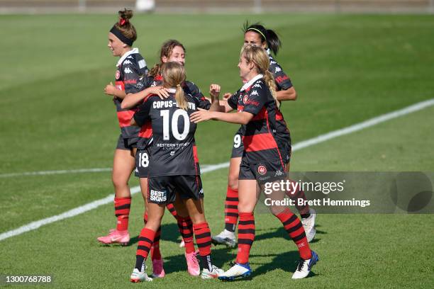Sarah Hunter of the Wanderers celebrates with team mates after scoring during the round seven W-League match between the Western Sydney Wanderers and...