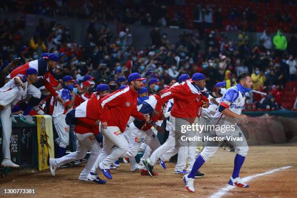 Players of Águilas Cibaeñas of Dominican Republic celebrate after winning the Final game of Serie del Caribe 2021 between Puerto Rico and Dominican...