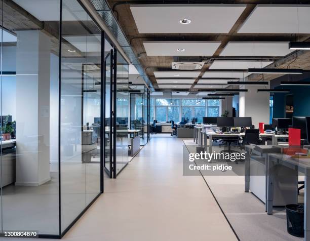 interior of an empty modern loft office open space - office desk no people stock pictures, royalty-free photos & images