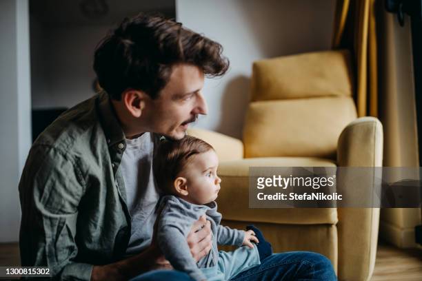 father and his baby boy - role model stock pictures, royalty-free photos & images
