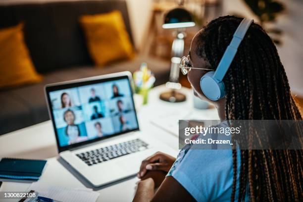 group of unrecognisable international students having online meeting - skype call stock pictures, royalty-free photos & images