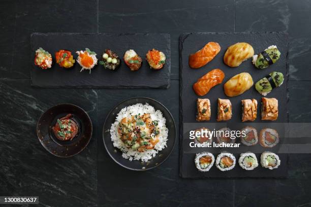 sushi and sushi roll set. rice bowls. gunkan set. tuna tataki. - sashimi imagens e fotografias de stock