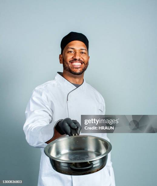 happy male chef with saucepan - holding saucepan stock pictures, royalty-free photos & images