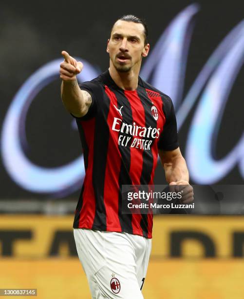 Zlatan Ibrahimovic of AC Milan celebrates after scoring their side's second goal during the Serie A match between AC Milan and FC Crotone at Stadio...