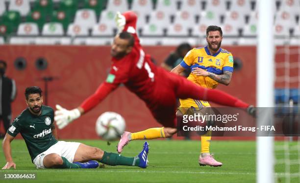 Andre-Pierre Gignac of Tigres UANL shoots under pressure from Luan Garcia of SE Palmeiras during the FIFA Club World Cup Qatar 2002 Semi-Final match...