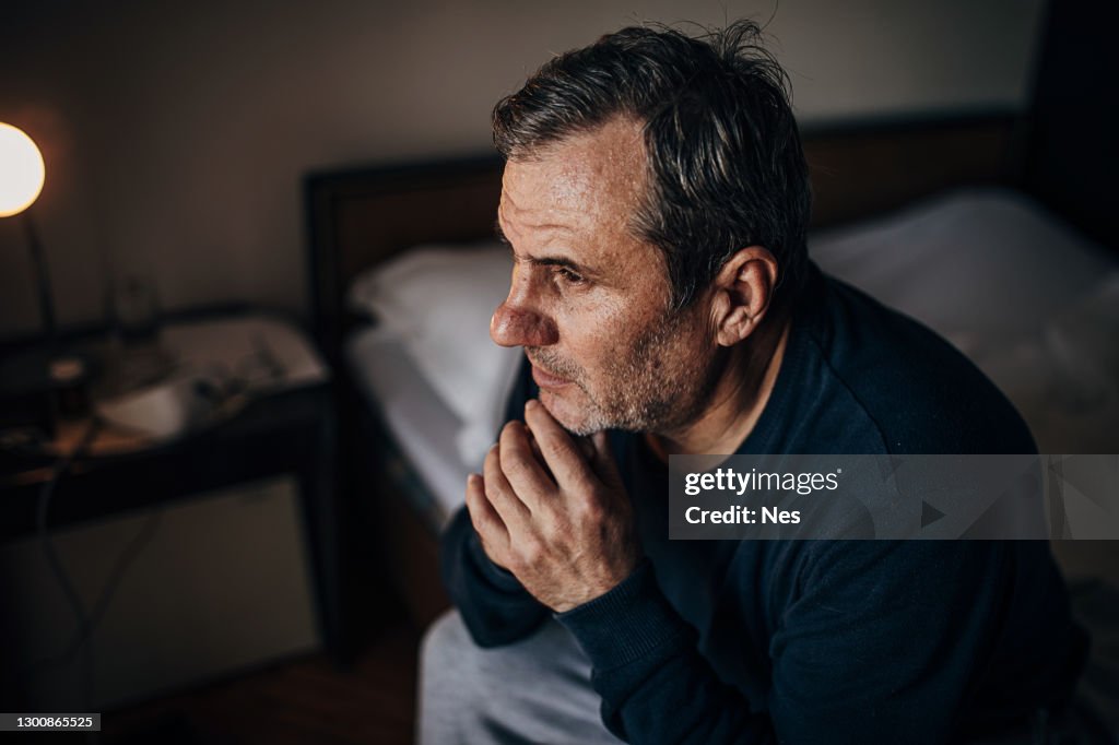 A depressed man because of loneliness