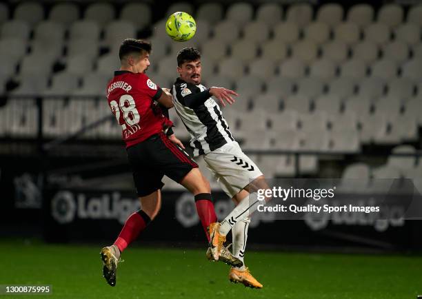 Arturo Molina of CD Castellon competes for the ball with Victor Meseguer of CD Mirandes during the Liga Smartbank match betwen CD Castellon and CD...