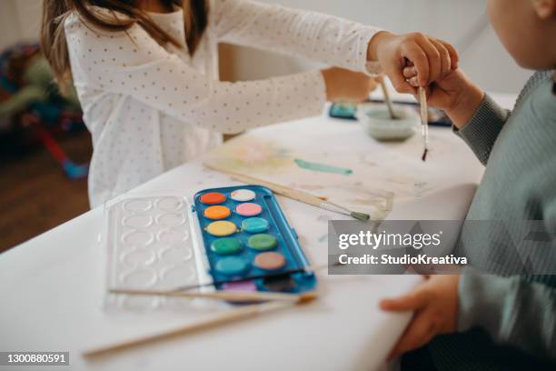 brother and sister painting - malfarbe stock pictures, royalty-free photos & images