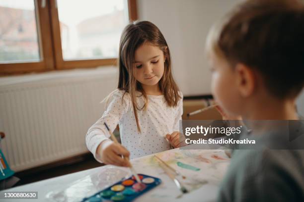 brother and sister painting - malfarbe stock pictures, royalty-free photos & images