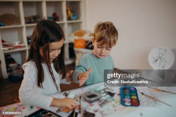 brother and sister painting - malfarbe stock pictures, royalty-free photos & images