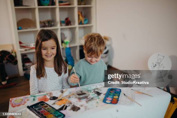 brother and sister painting - malfarbe stock pictures, royalty-free photos & images