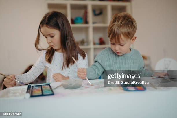 brother and sister painting - malfarbe stock pictures, royalty-free photos & images