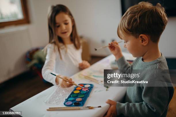 brother and sister painting - malfarbe stock pictures, royalty-free photos & images