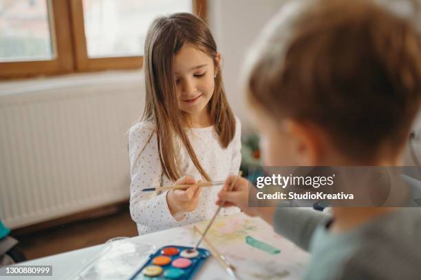 brother and sister painting - malfarbe stock pictures, royalty-free photos & images