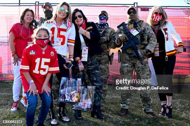 Randi Martin , the mother of Patrick Mahomes of the Kansas City Chiefs, poses for a photo with members of law enforcement as she arrives at the...