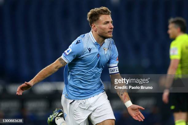 Ciro Immobile of SS Lazio celebrates after scoring their side's first goal during the Serie A match between SS Lazio and Cagliari Calcio at Stadio...