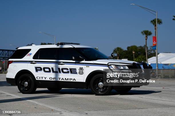 Police vehicle patrols the streets prior to Super Bowl LV when the Tampa Bay Buccaneers will take on the defending champion Kansas City Chiefs at...