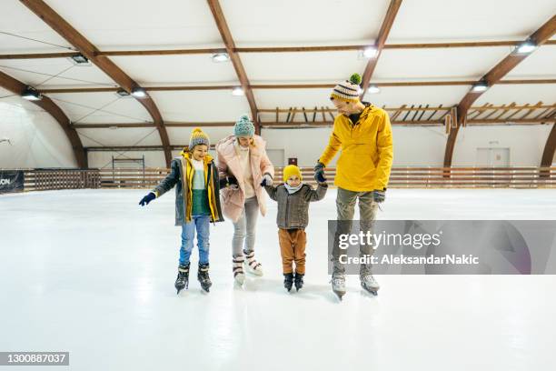 family ice-skating - ice skating rink stock pictures, royalty-free photos & images