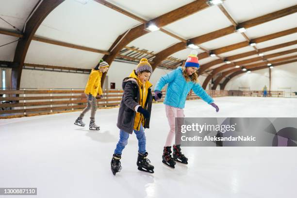 ice-skating with my sister - hockey skate stock pictures, royalty-free photos & images