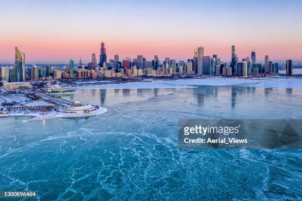 chicago skyline and frozen lake michigan - aerial view - chicago loop imagens e fotografias de stock