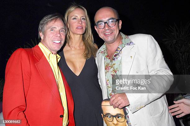 Tommy Hilfiger, his Wife and Karl Zero during 2006 Cannes Film Festival - Dans La Peau de Jacques Chirac Premiere After Party at VIP Room in Cannes,...