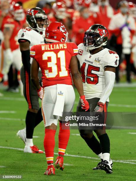Devin White of the Tampa Bay Buccaneers and Darrel Williams of the Kansas City Chiefs after a play in the second quarter in Super Bowl LV at Raymond...