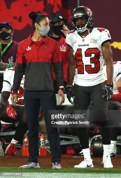 Assistant Strength & Conditioning Coach Maral Javadifar stands on the sideline with Ross Cockrell of the Tampa Bay Buccaneers in the first half...