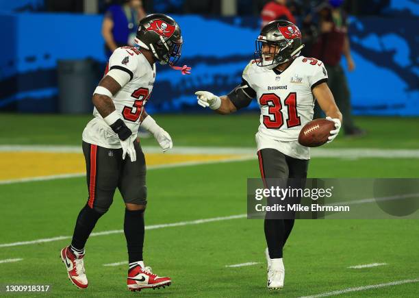 Antoine Winfield Jr. #31 of the Tampa Bay Buccaneers reacts after an interception in the third quarter against the Kansas City Chiefs in Super Bowl...