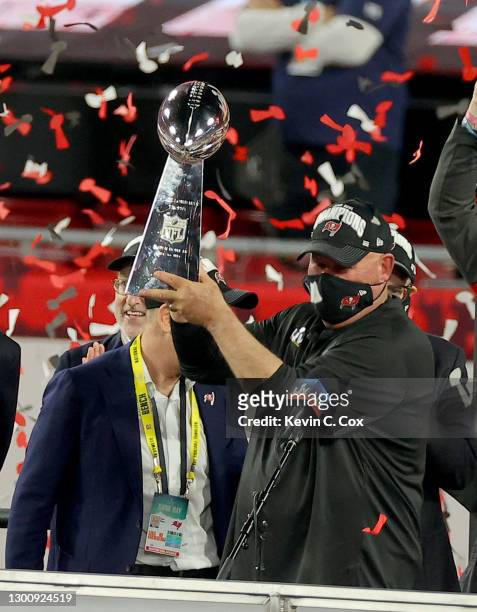 Head coach Bruce Arians of the Tampa Bay Buccaneers lifts the Lombardi Trophy after defeating the Kansas City Chiefs in Super Bowl LV at Raymond...