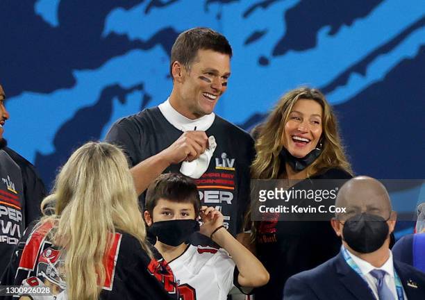 Tom Brady of the Tampa Bay Buccaneers celebrates with Gisele Bundchen after winning Super Bowl LV at Raymond James Stadium on February 07, 2021 in...