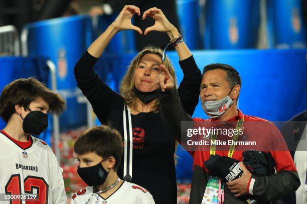 Gisele Bundchen, wife of Tom Brady of the Tampa Bay Buccaneers, celebrates after the Buccaneers defeated the Kansas City Chiefs in Super Bowl LV at...