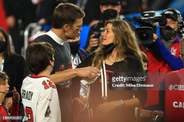 Tom Brady of the Tampa Bay Buccaneers celebrates with Gisele Bundchen after winning Super Bowl LV at Raymond James Stadium on February 07, 2021 in...
