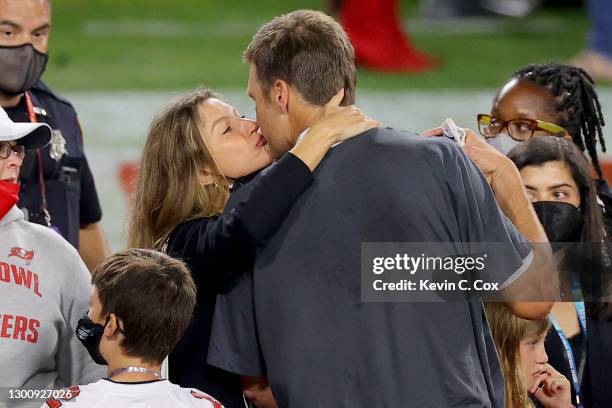 Tom Brady of the Tampa Bay Buccaneers celebrates with Gisele Bundchen after winning Super Bowl LV at Raymond James Stadium on February 07, 2021 in...