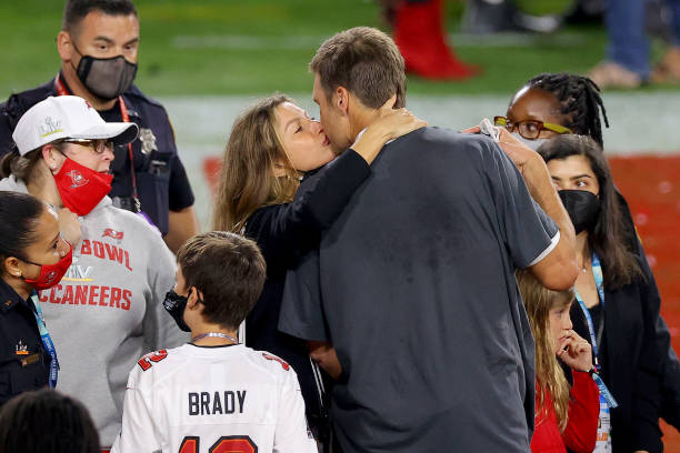 Tom Brady of the Tampa Bay Buccaneers celebrates with Gisele Bundchen after winning Super Bowl LV at Raymond James Stadium on February 07, 2021 in...